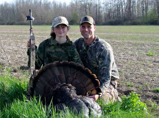 Autumn Bigger - father daughter with a turkey