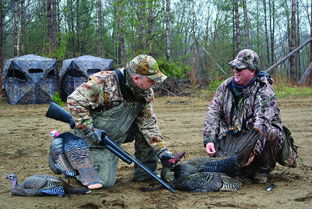 Managing Editor Ray Blades, left, with guide Brian Sheppard with a tom.