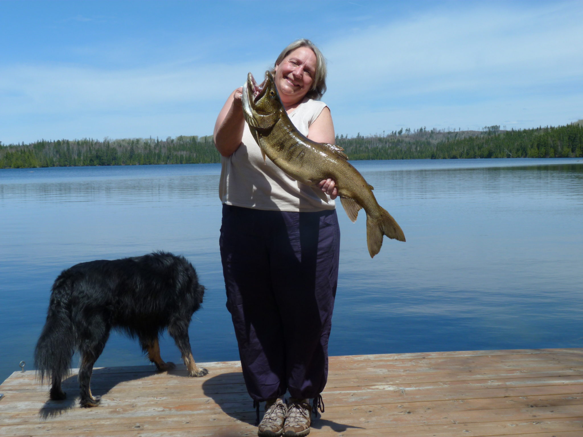 karen - woman holding a trout